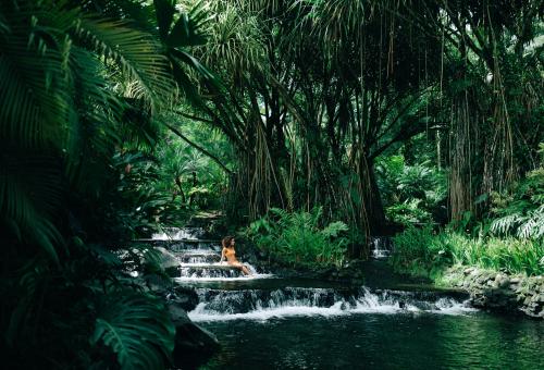 Woman in natural pools in Costa Rica